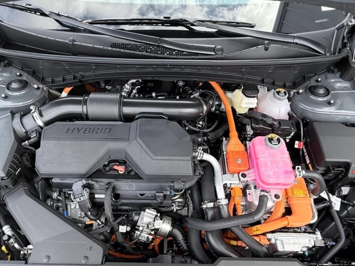 The hybrid engine of a 2026 Hyundai Tucson at Crain Hyundai of Bentonville, covered by America's Best Warranty.